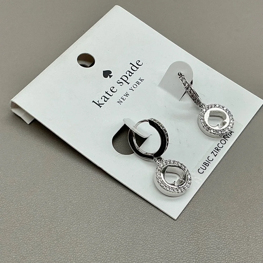 Kate Spade New York Earrings Women Silver Tone Cubic Zirconia Spade Logo Huggie